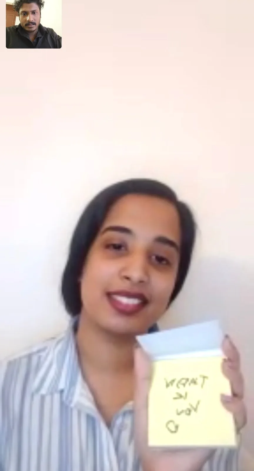 A thank you on a sticky note